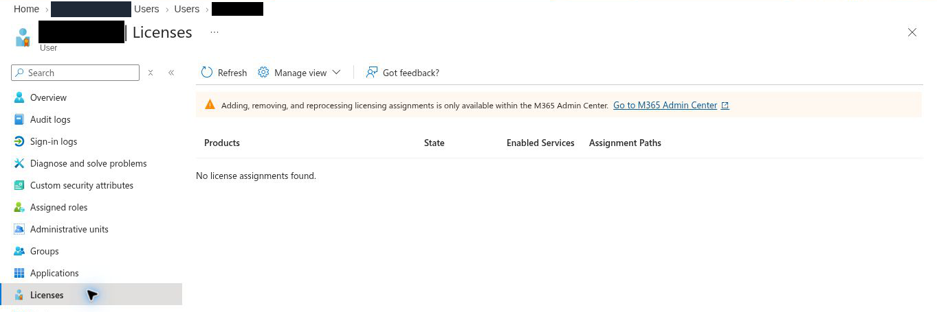 Licenses page of the test user in Microsoft Entra reading No license assignments found, with a note that changes are made in the M365 admin center; account name and directory name hidden